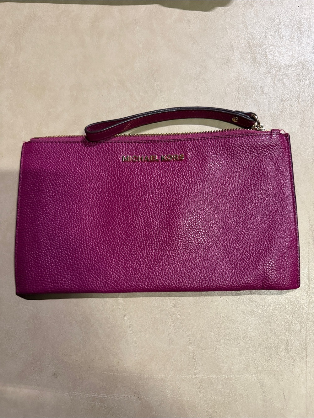 Michael Kors Fuchsia Pebbled Leather Pouch with Gold Logo